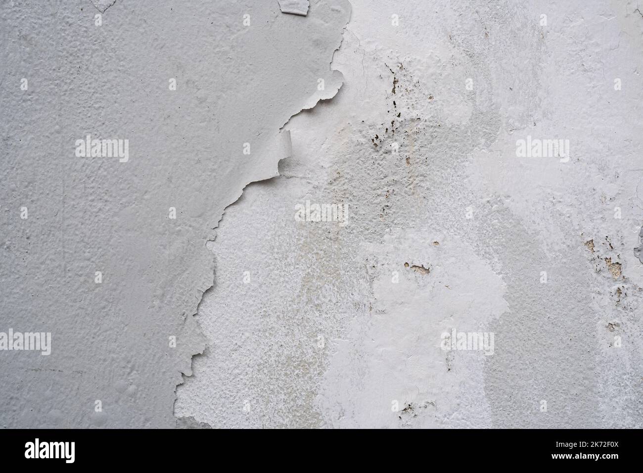 White wall with peeling paint Stock Photo