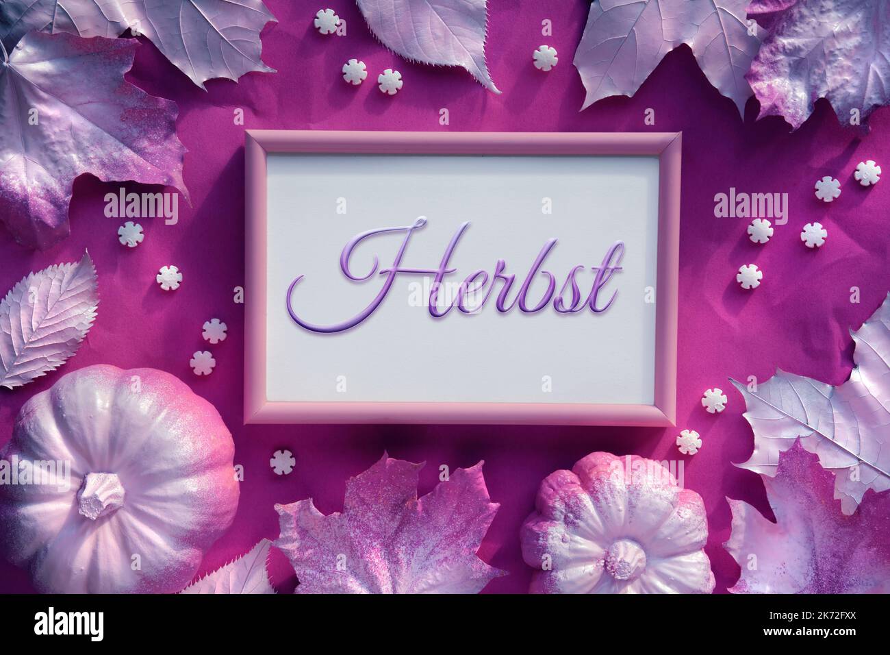 Autumn magenta frame with word Herbst that means Fall in German