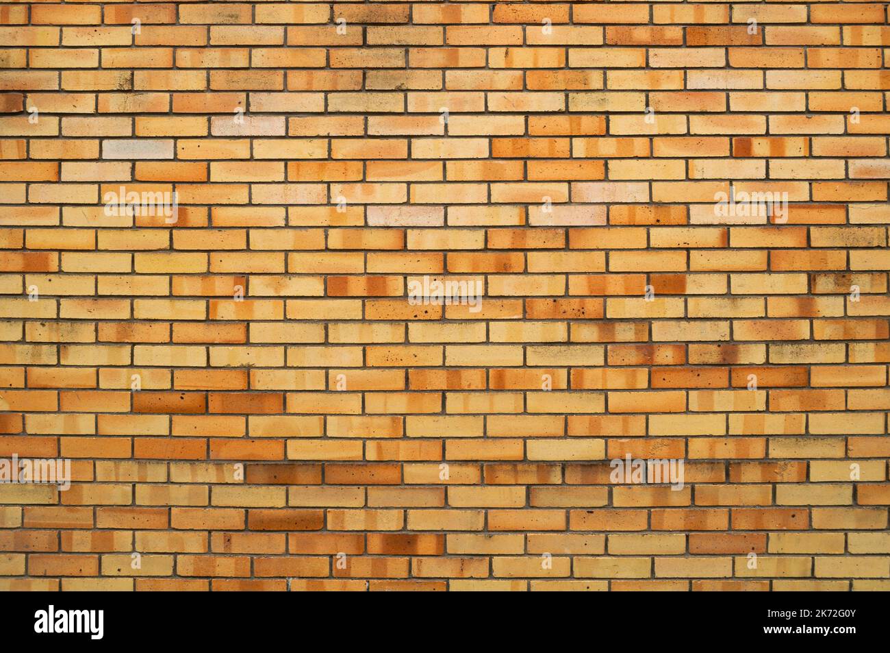 Brick wall background, new yellow bricks wall pattern. Texture brick wall of yellow color Stock Photo