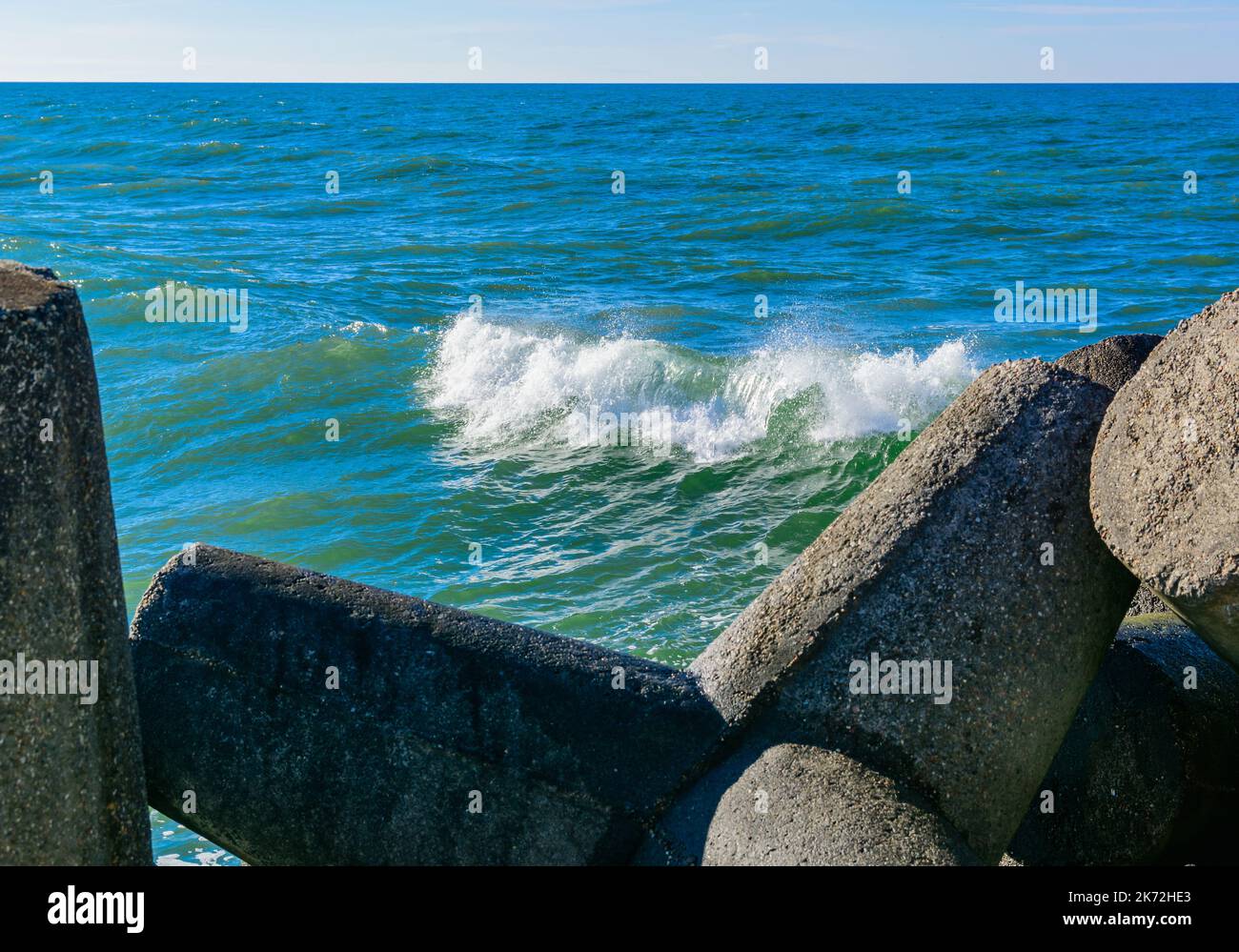 Wave breaker along the sea shore on the sand beach Stock Photo Alamy