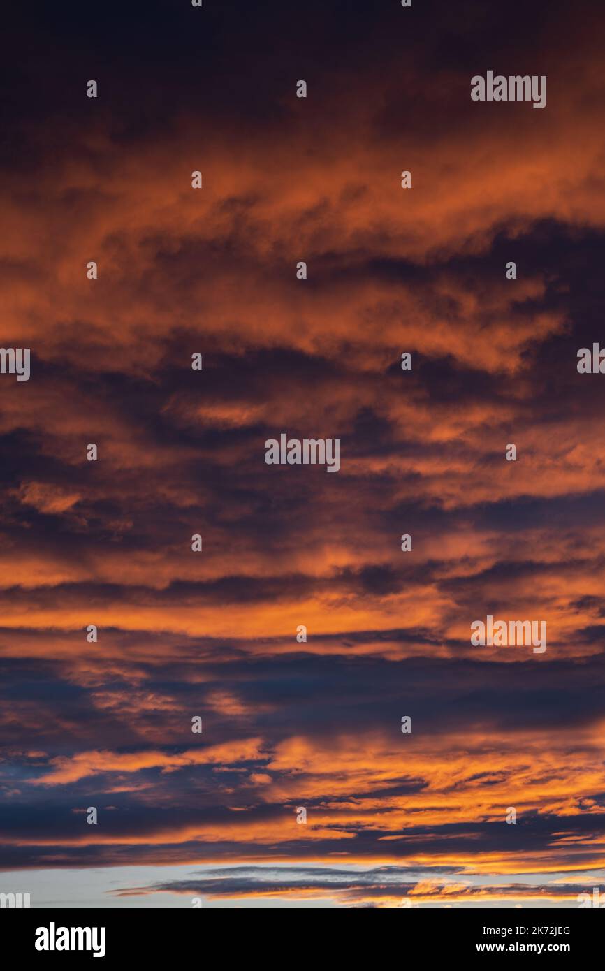 Sunset sky with orange clouds. Nature background Stock Photo - Alamy