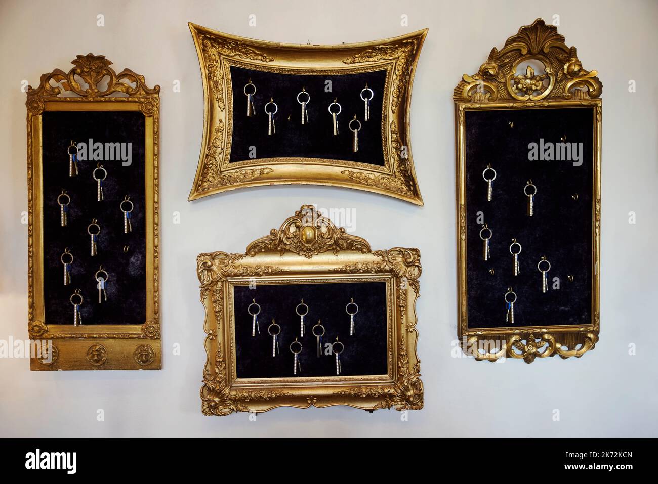 Hotel keys hanging inside picture frames Stock Photo Alamy