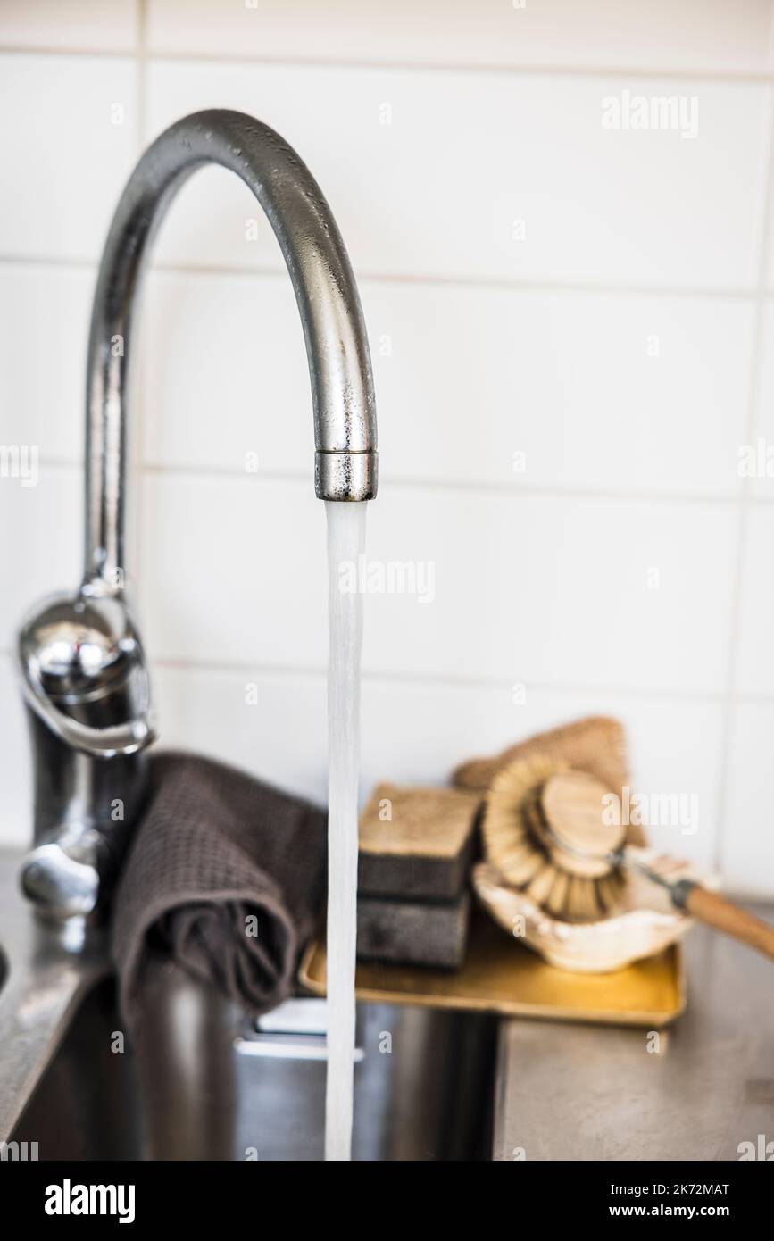 Water running in kitchen sink Stock Photo Alamy
