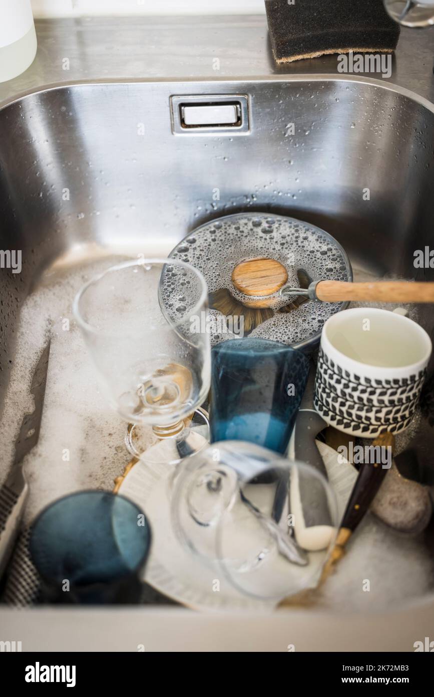 Dirty dishes in kitchen sink Stock Photo Alamy