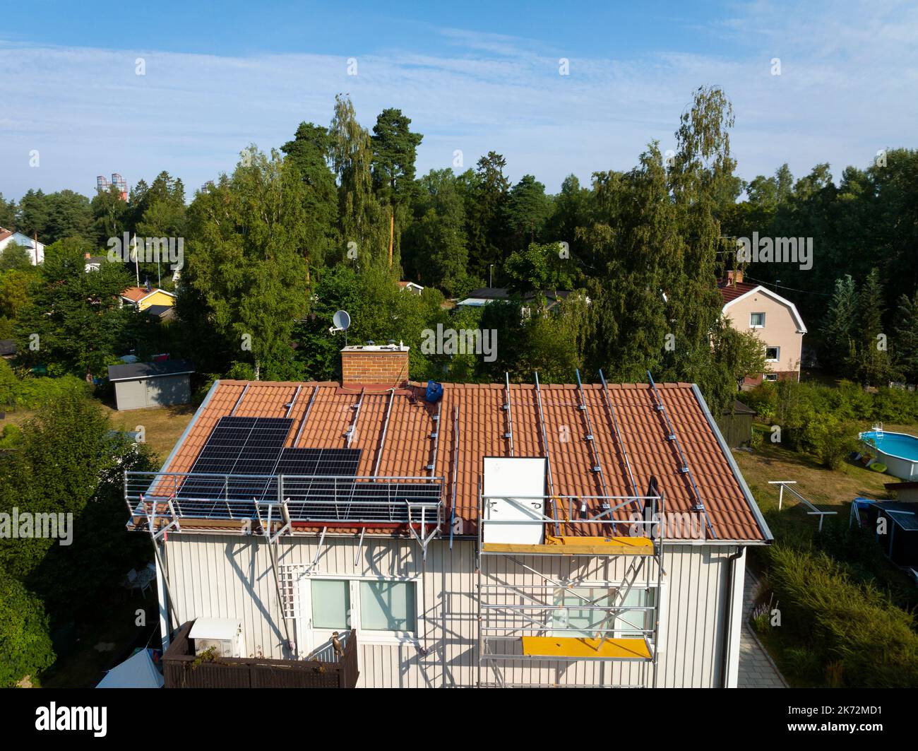 men-installing-solar-panels-on-roof-stock-photo-alamy