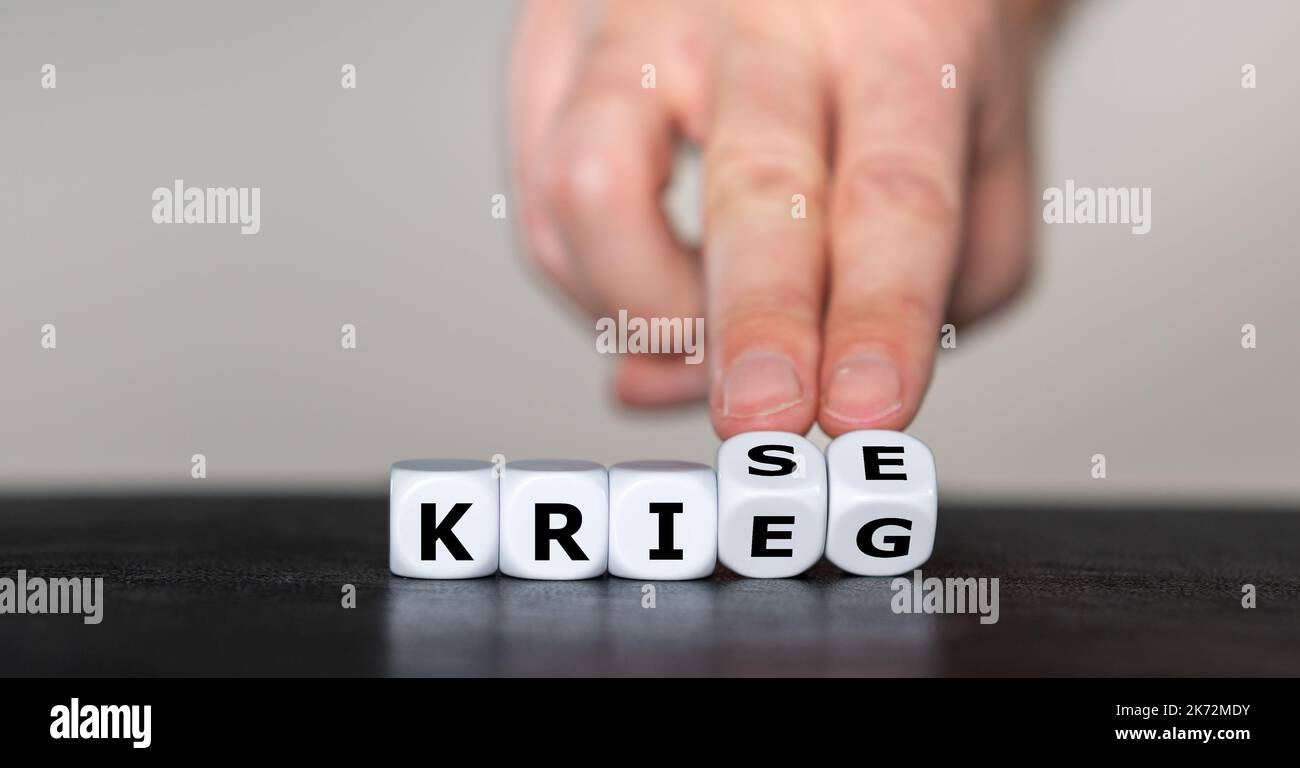 Dice form the German words 'Krieg' (war) and 'Krise' (crisis Stock