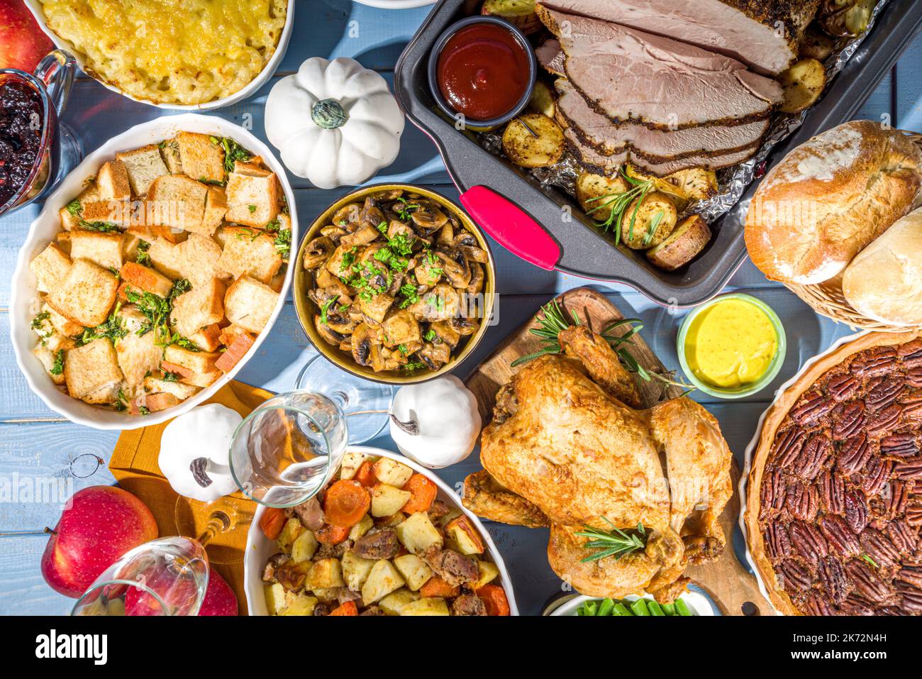 Thanksgiving dinner table with new traditional thanksgiving food