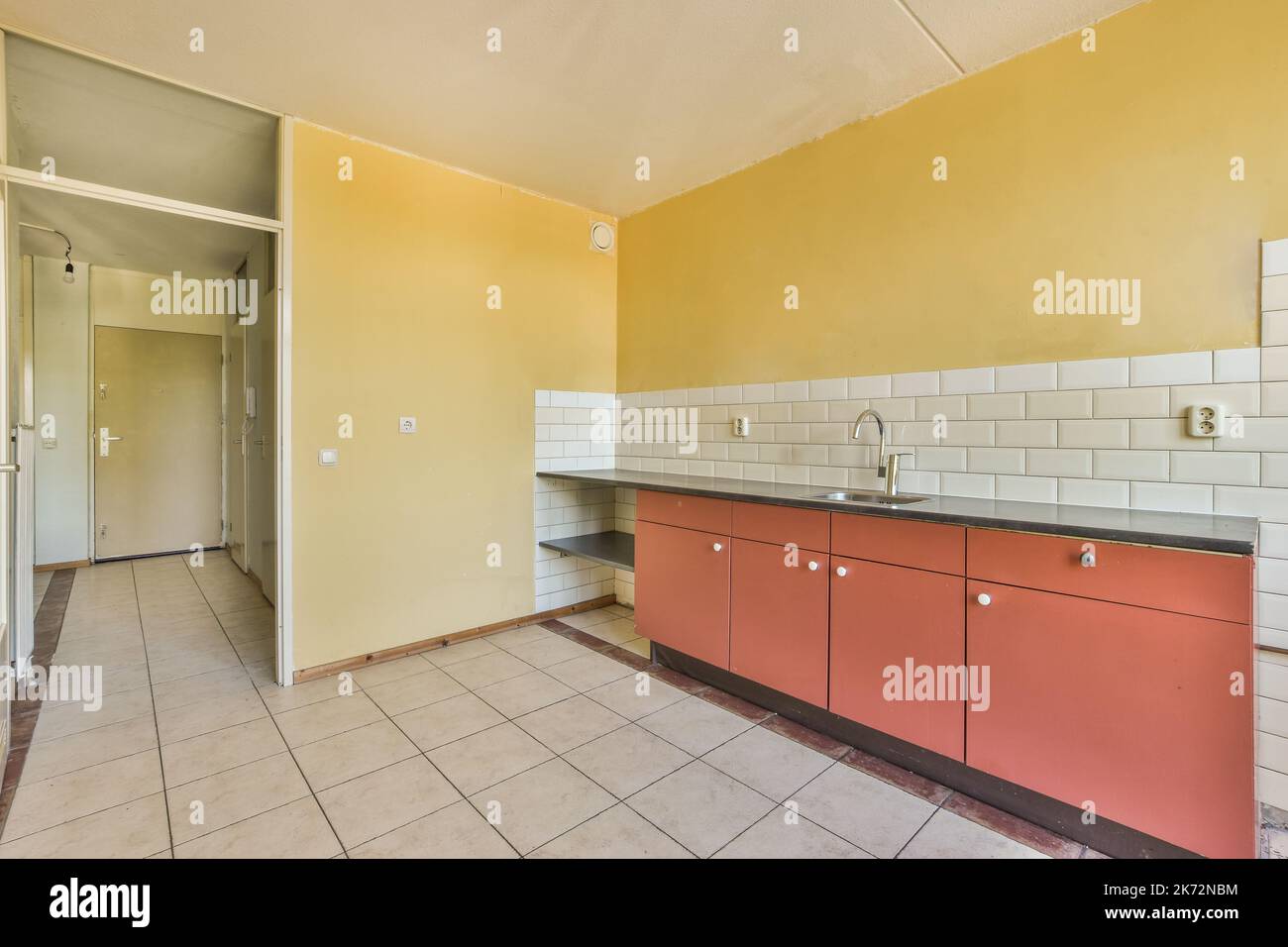 Interior of empty kitchen with windows Stock Photo Alamy