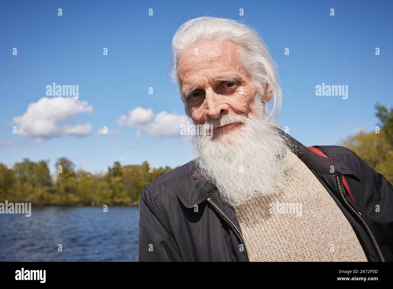 Senior man looking at camera Stock Photo