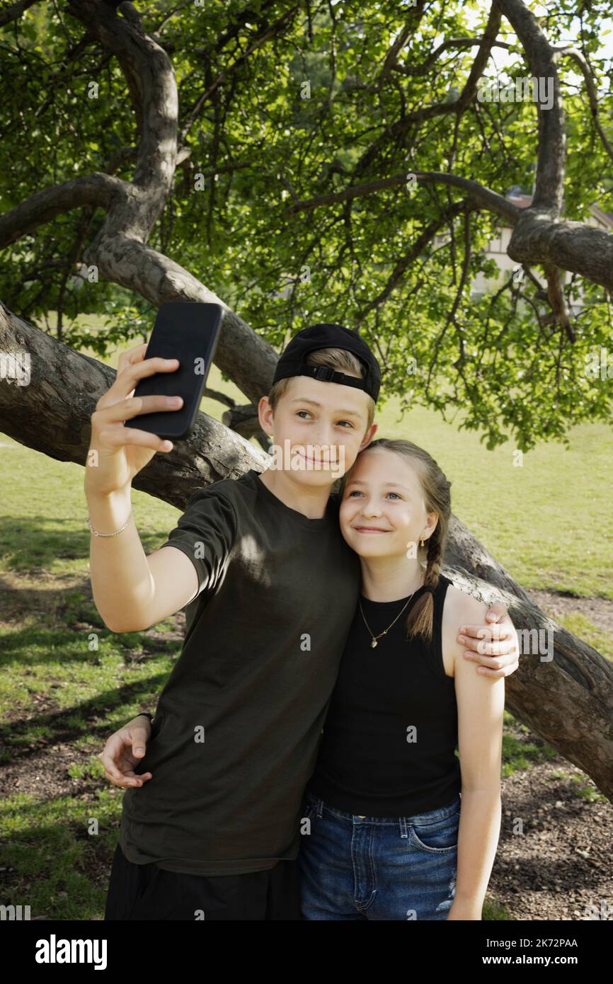 Brother and sister having selfie Stock Photo Alamy