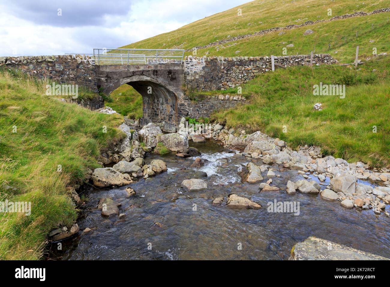Old stone bridge over Tella Water in the Scottish border Stock Photo