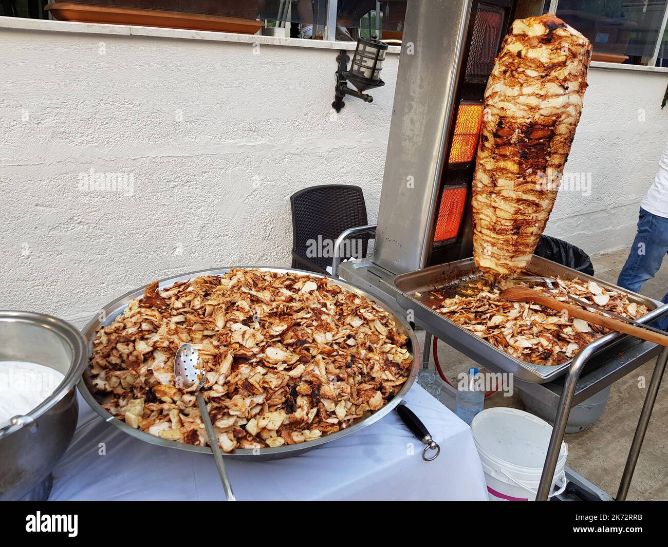 Chicken shawarma grilling a vertical spit. Traditional Turkish food