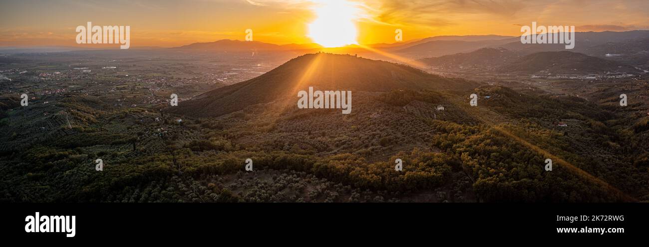 Tuscany hills sunset. Beautiful aerial shot of scenic landscape Stock Photo