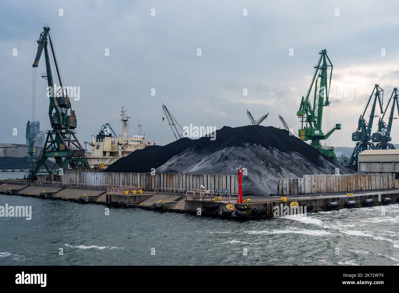Little ammount of black coal in the sea port. Limitations in black coal delivery in Poland and Europe. Energy crisis due to high cost of energy. Stock Photo