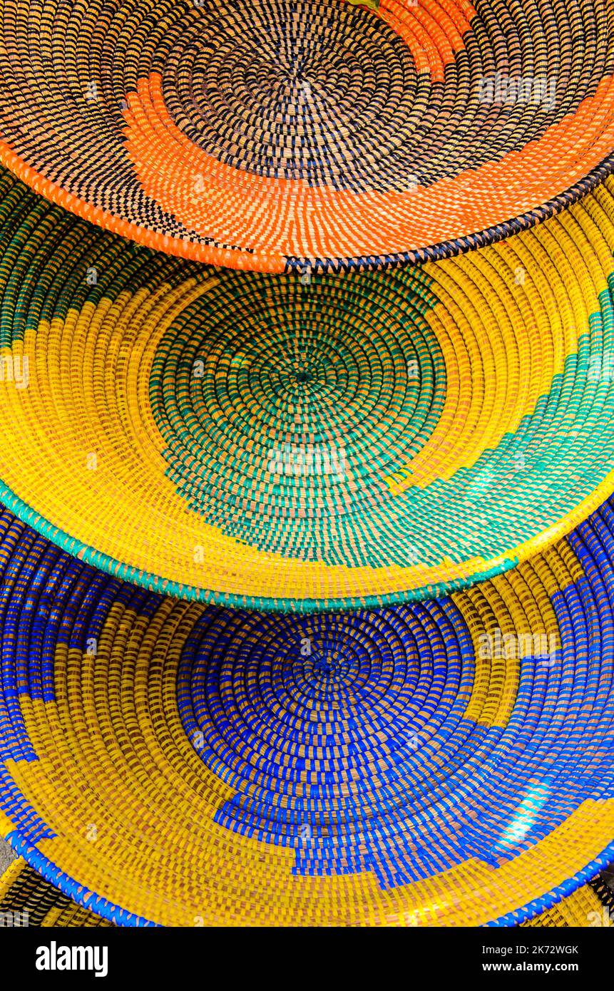 Three colored woven baskets from natural materials in detail view Stock Photo
