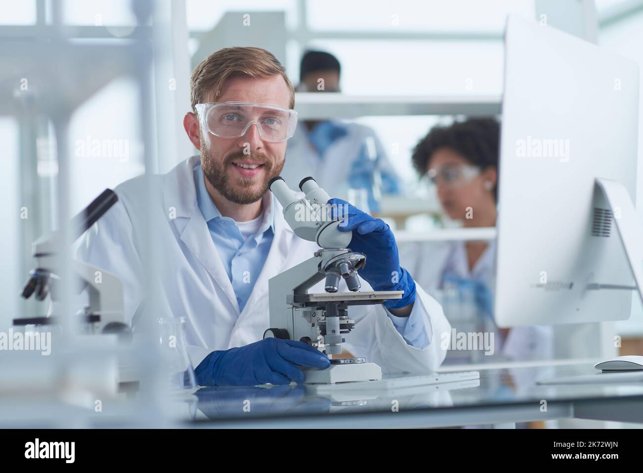In a Modern Laboratory Research Scientist Conducts Experiments Stock ...