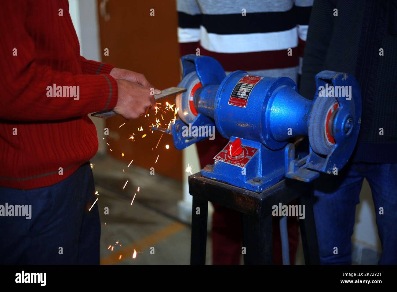 man working,iron,machine,grinder,grinder sparks,machine work,iron