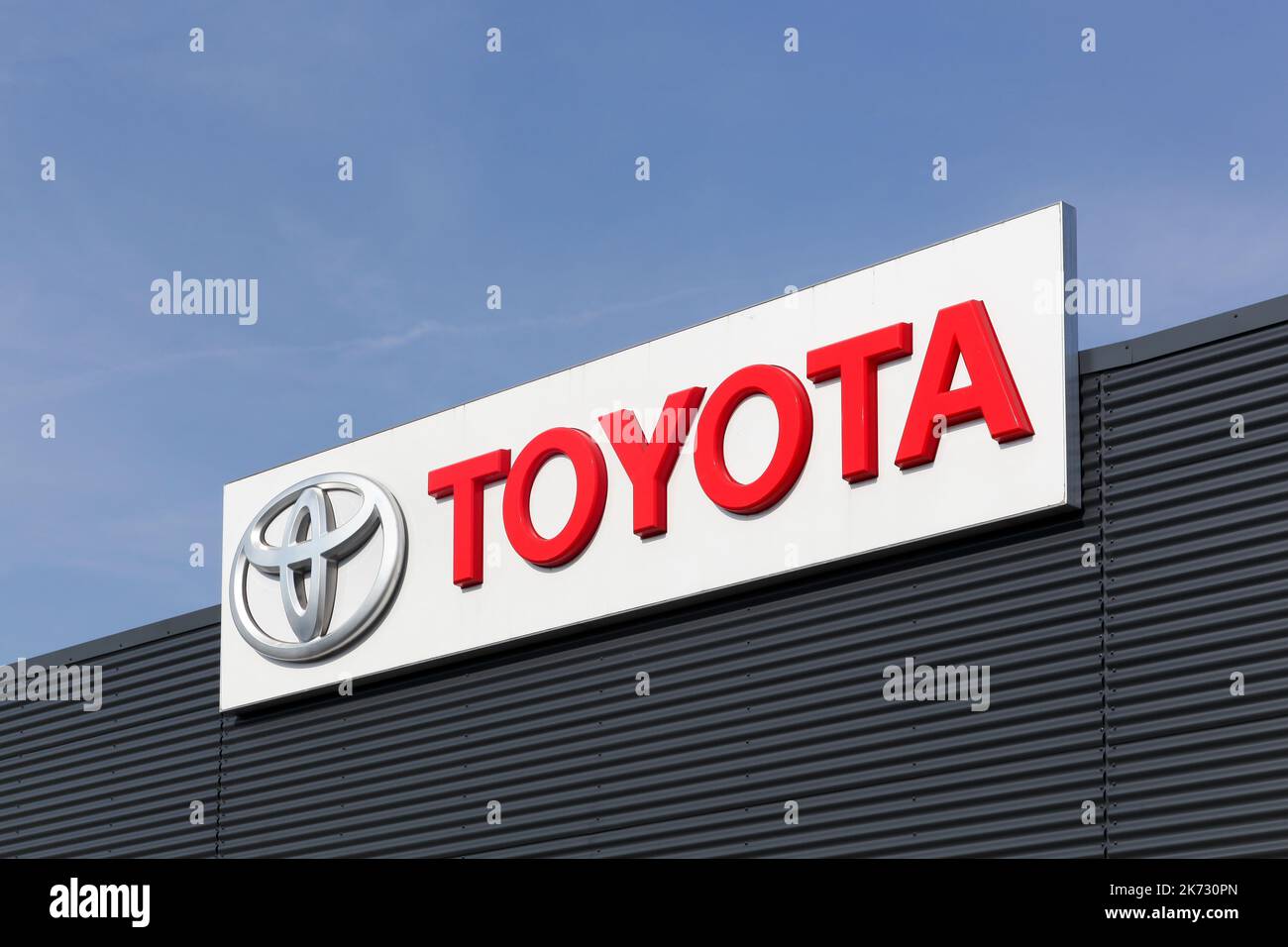 Aarhus, Denmark - September 25, 2016: Toyota logo on a facade. Toyota Motor Corporation is a Japanese automotive manufacturer Stock Photo