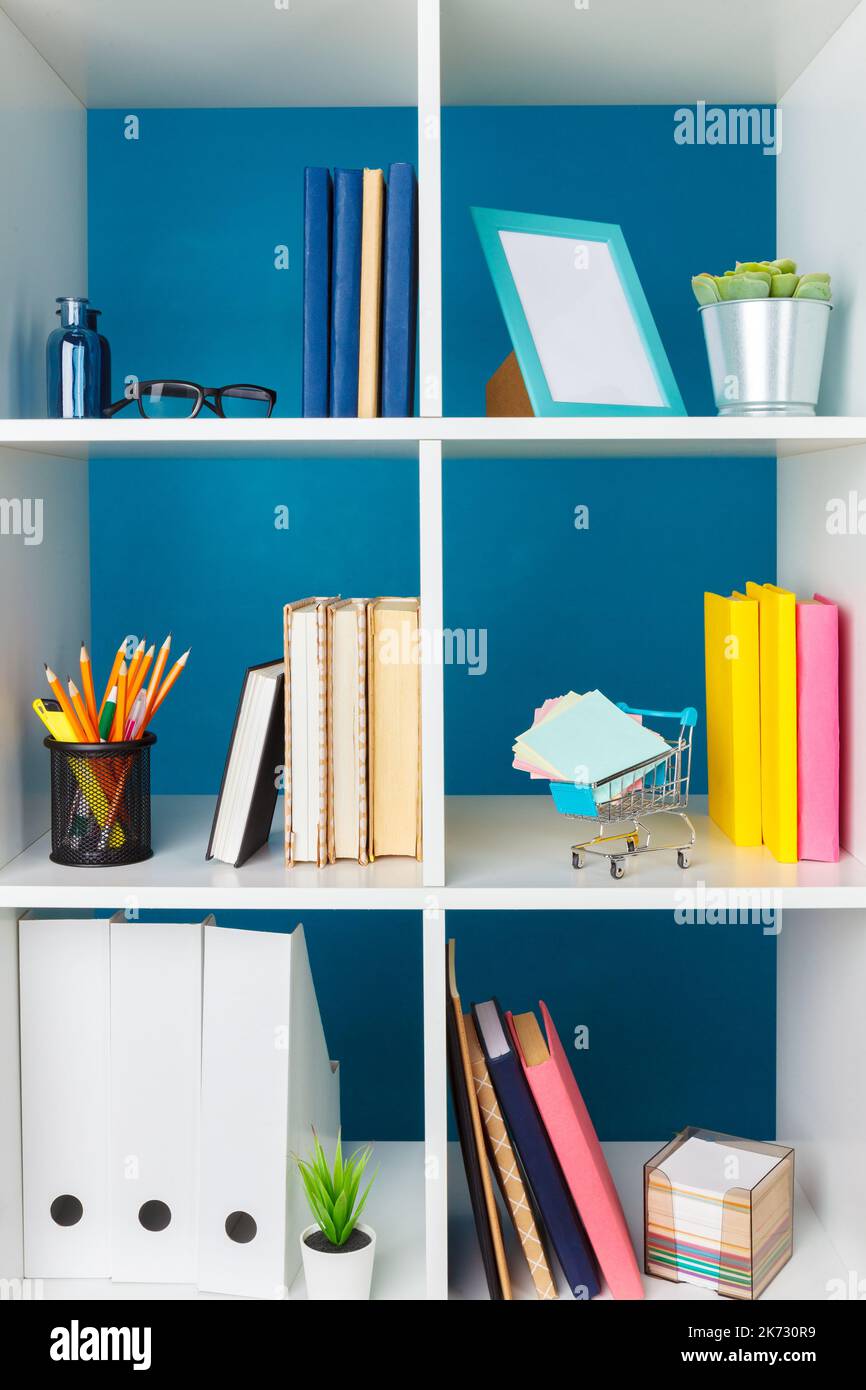 Stacks of supplies and paperwork in the office and bookshelves Stock ...