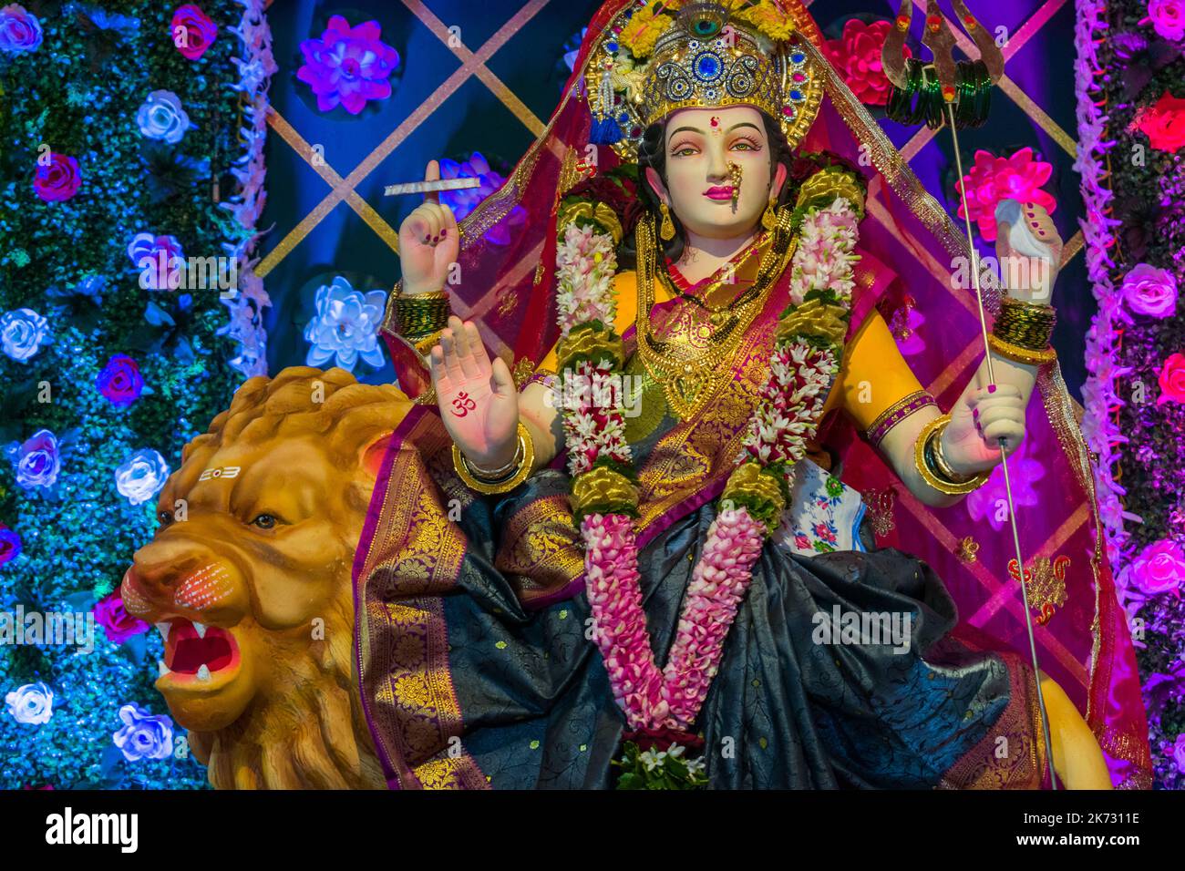 A beautiful idol of Maa Durga being worshipped at a mandal in Mumbai for the auspicious Indian festival of Navratri Stock Photo