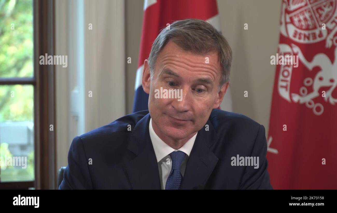 PA video grab image of Chancellor Jeremy Hunt speaking to the nation from the Treasury in London, during an emergency statement as he confirmed he is ditching many of the measures in the mini-budget, including the planned cut to income tax. Picture date: Monday October 17, 2022. Stock Photo