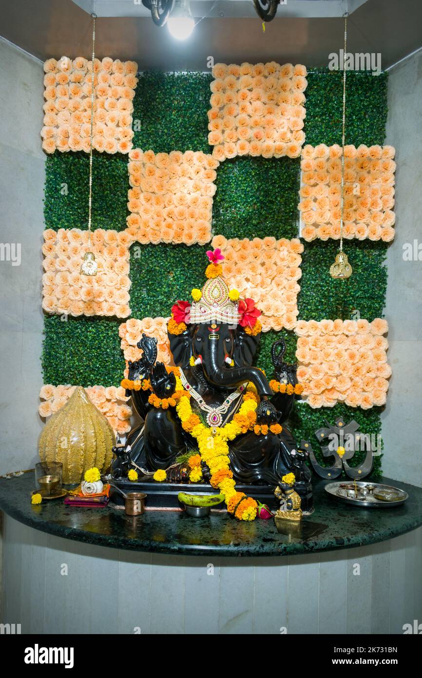 A Beautiful Idol Of Lord Ganesha At A Hindu Temple In Mumbai India a-beautiful-idol-of-lord-ganesha-at-a-hindu-temple-in-mumbai-india