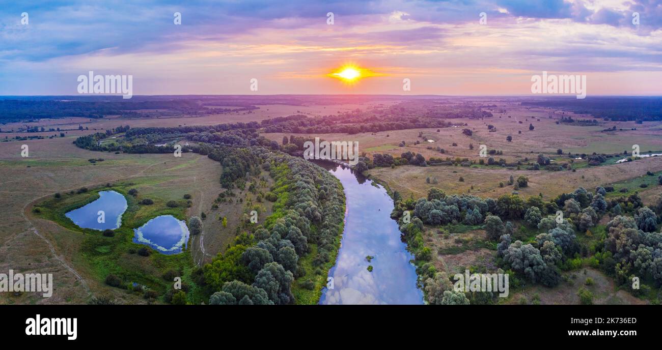Aerial view on awesome colorful sunrise over The Seym River. Stock Photo