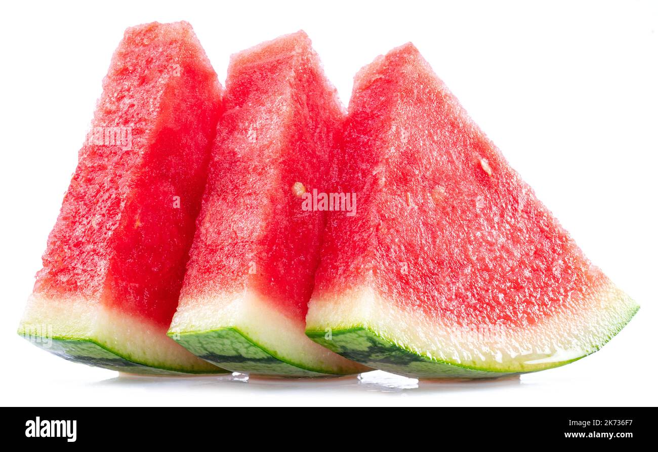 Three slices of watermelon without watermelon seeds isolated on white background. Stock Photo