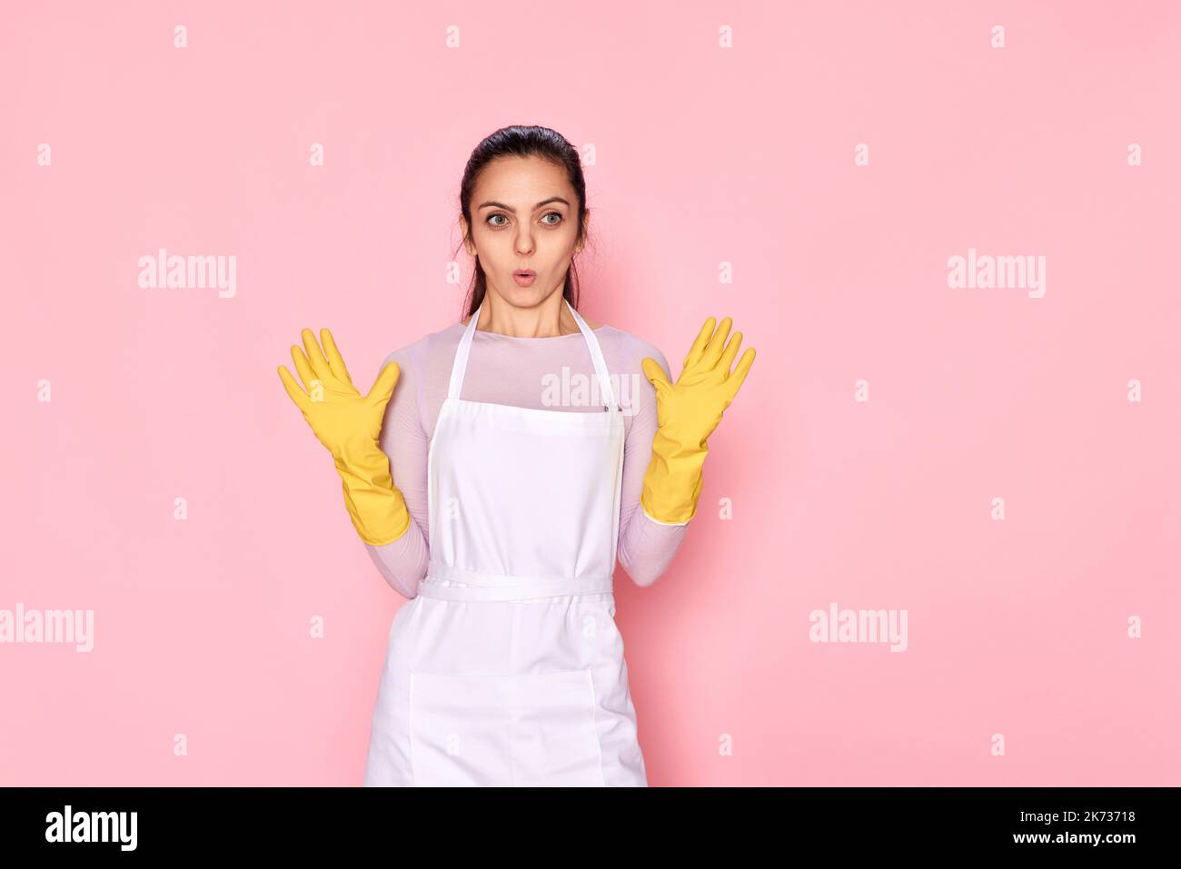 woman in rubber gloves and cleaner apron Stock Photo - Alamy