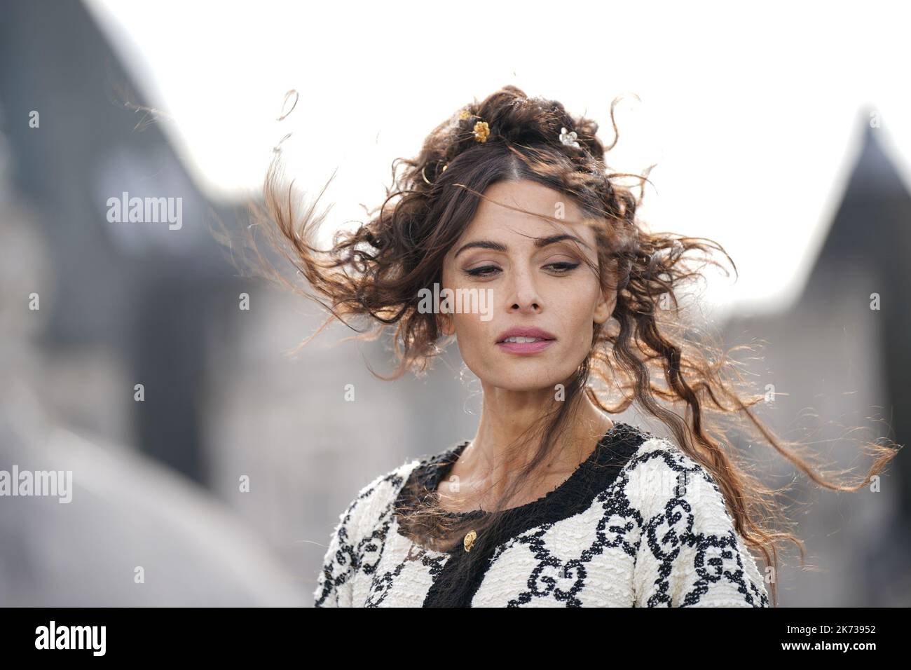 Sarah Shahi, during a photo call for Warner Bros' Black Adam at the