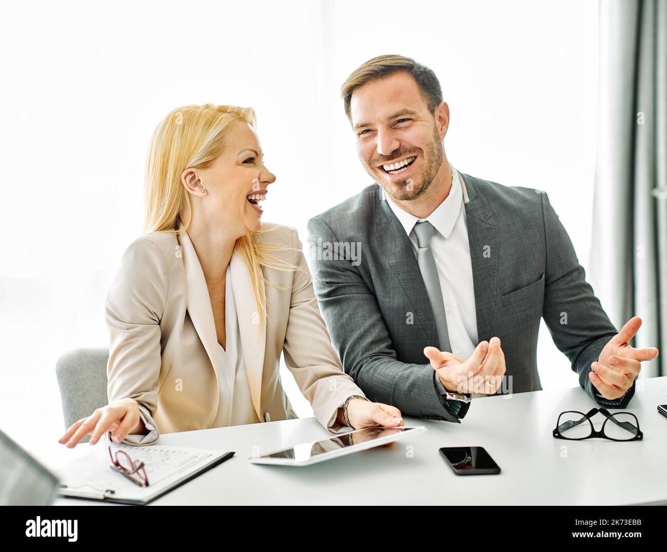 young business people meeting office teamwork success corporate discussion tablet businessman Stock Photo