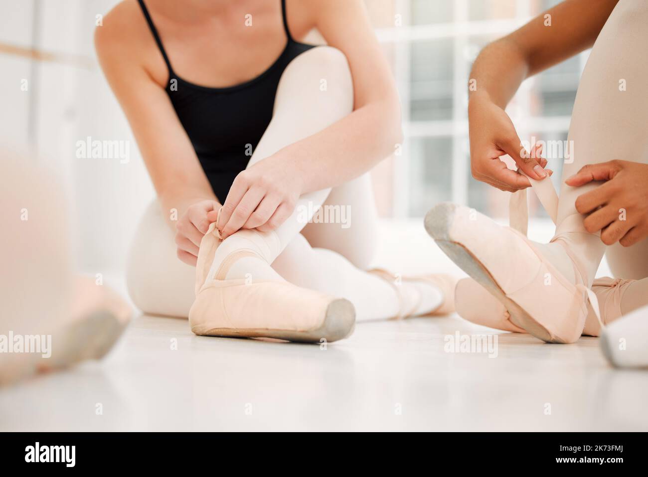 A broken wrist and a big trapeze. two unrecognizable ballet dancers