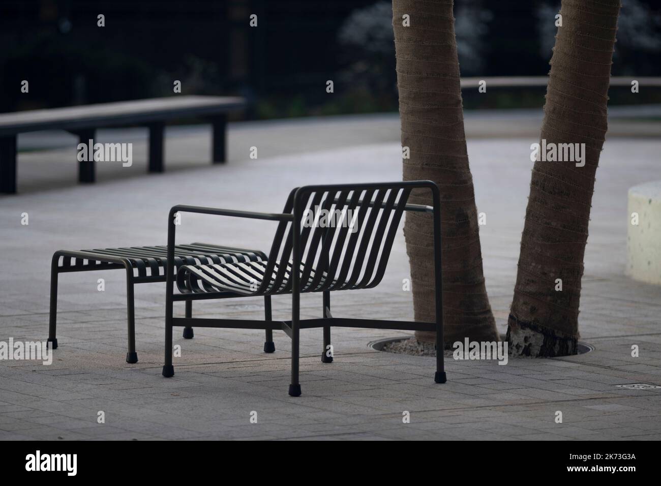 Detail of seating with benches behind. Exchange Square, London, United Kingdom. Architect: DSDHA, 2022. Stock Photo