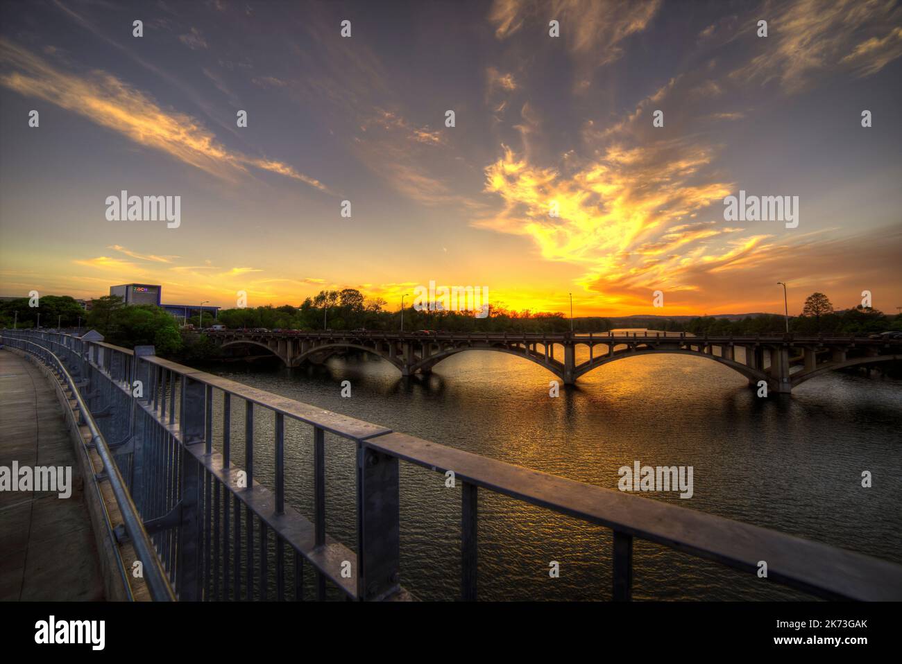 The Lamar Boulevard bridge over Lady Bird Lake during sunset in Austin ...