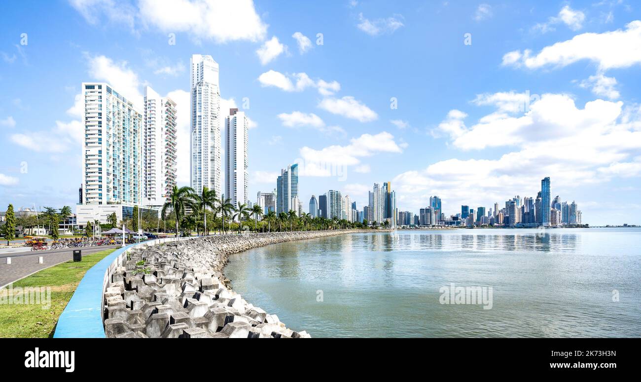 Panorama view of modern skyline at Panama City waterfront - International metropolis concept with highrise buildings and beach boardwalk at central am Stock Photo