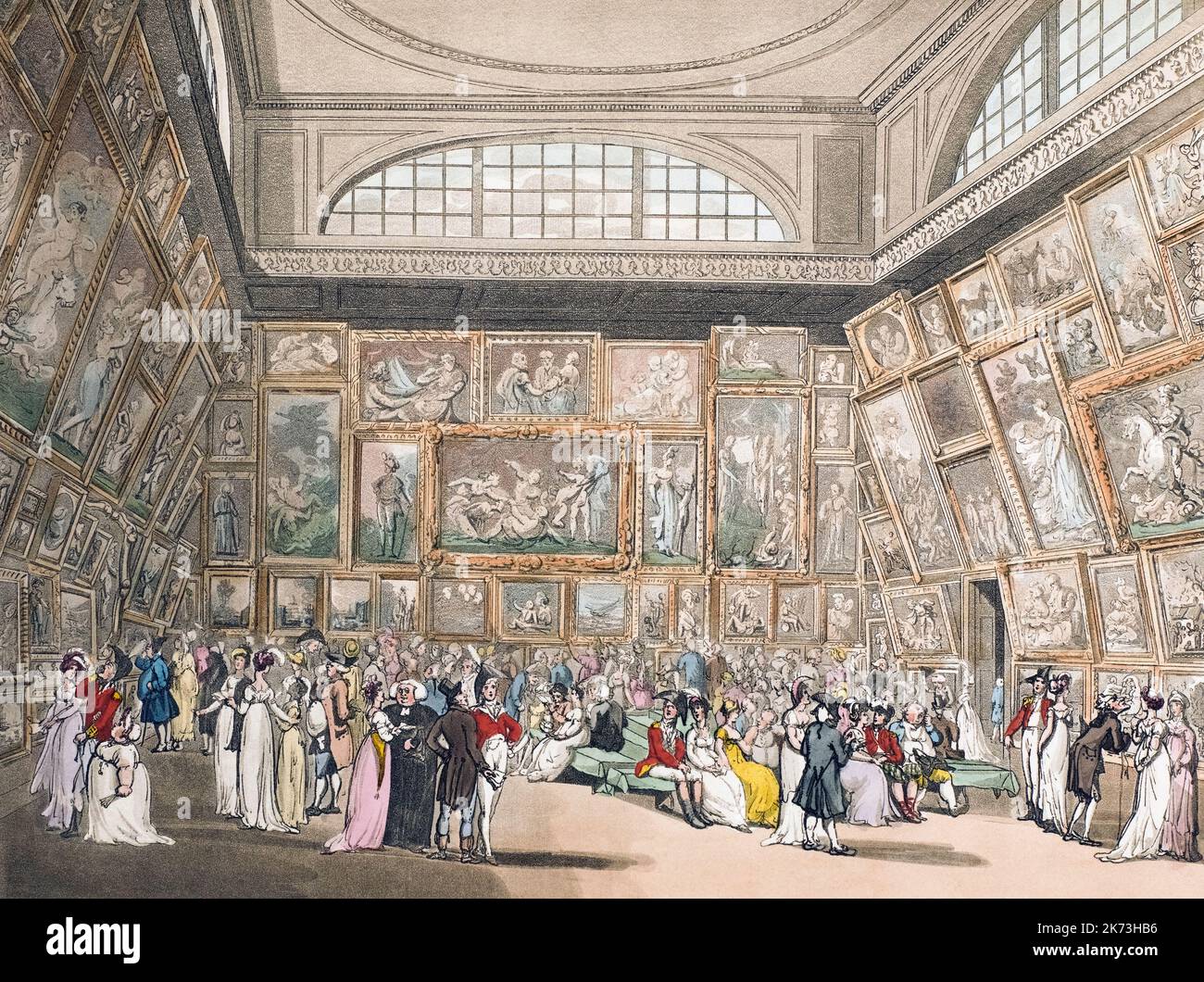 Exhibition room, Somerset House.  Circa 1808.  The Great Room of the Royal Academy.  (This room is now part of the Courtauld Gallery). After a work by August Pugin and Thomas Rowlandson in the Microcosm of London, published in three volumes between 1808 and 1810 by Rudolph Ackermann.   Pugin was the artist responsible for the architectural elements in the Microcosm pictures; Thomas Rowlandson was hired to add the lively human figures. Stock Photo