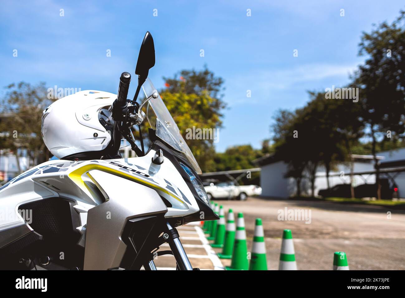 safe driving concept. closeup helmet on bigbike with soft-focus and over light in the background Stock Photo