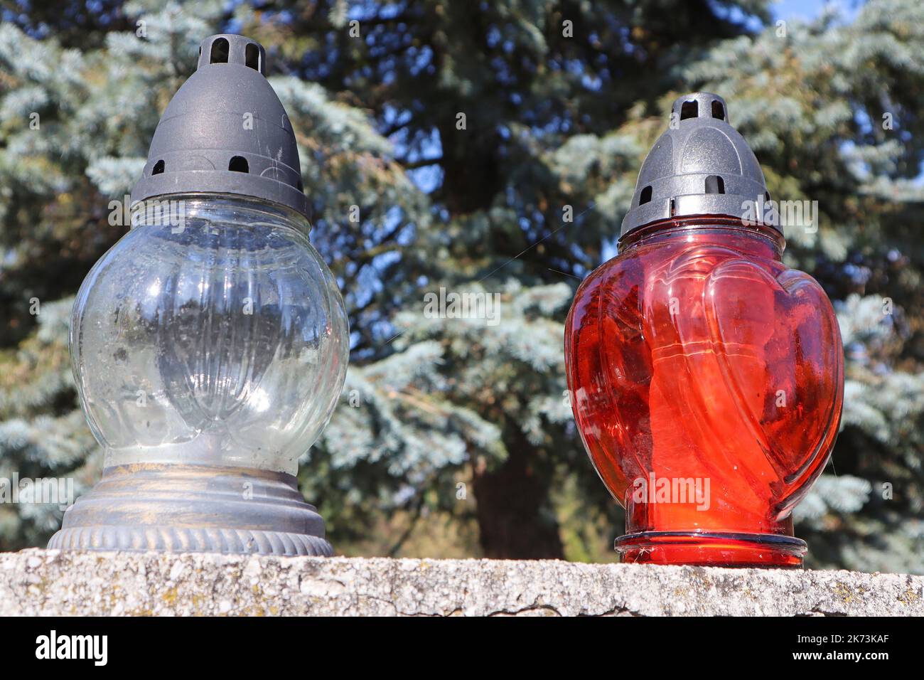 Red lantern on the tombstone in the public cemetery Stock Photo Alamy