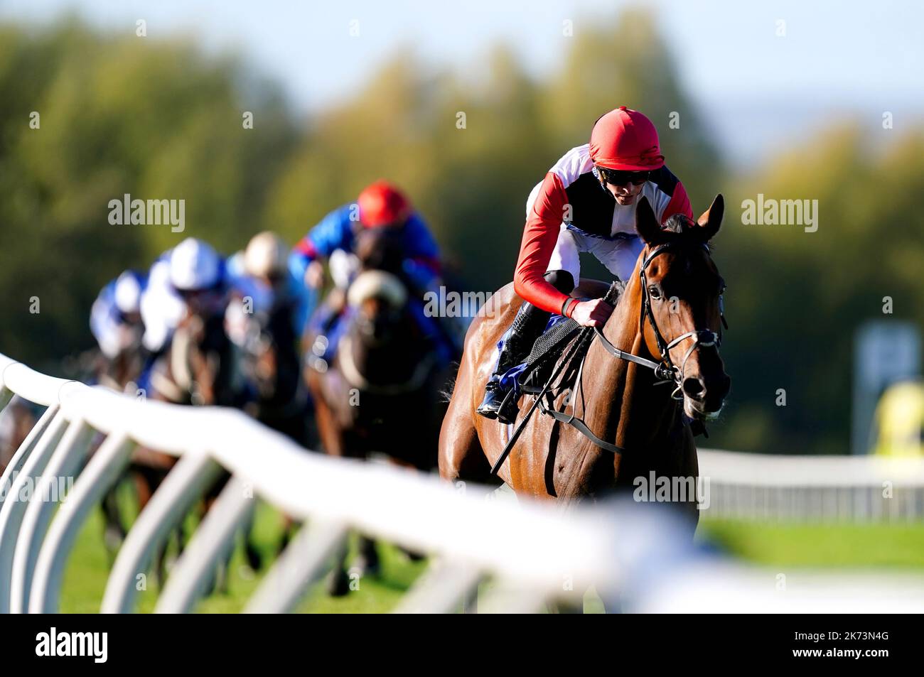 Poker Face ridden by jockey James Doyle (right) on their way to winning the Racing TV Club Day Handicap at Pontefract Racecourse, West Yorkshire. Picture date: Monday October 17, 2022. Stock Photo