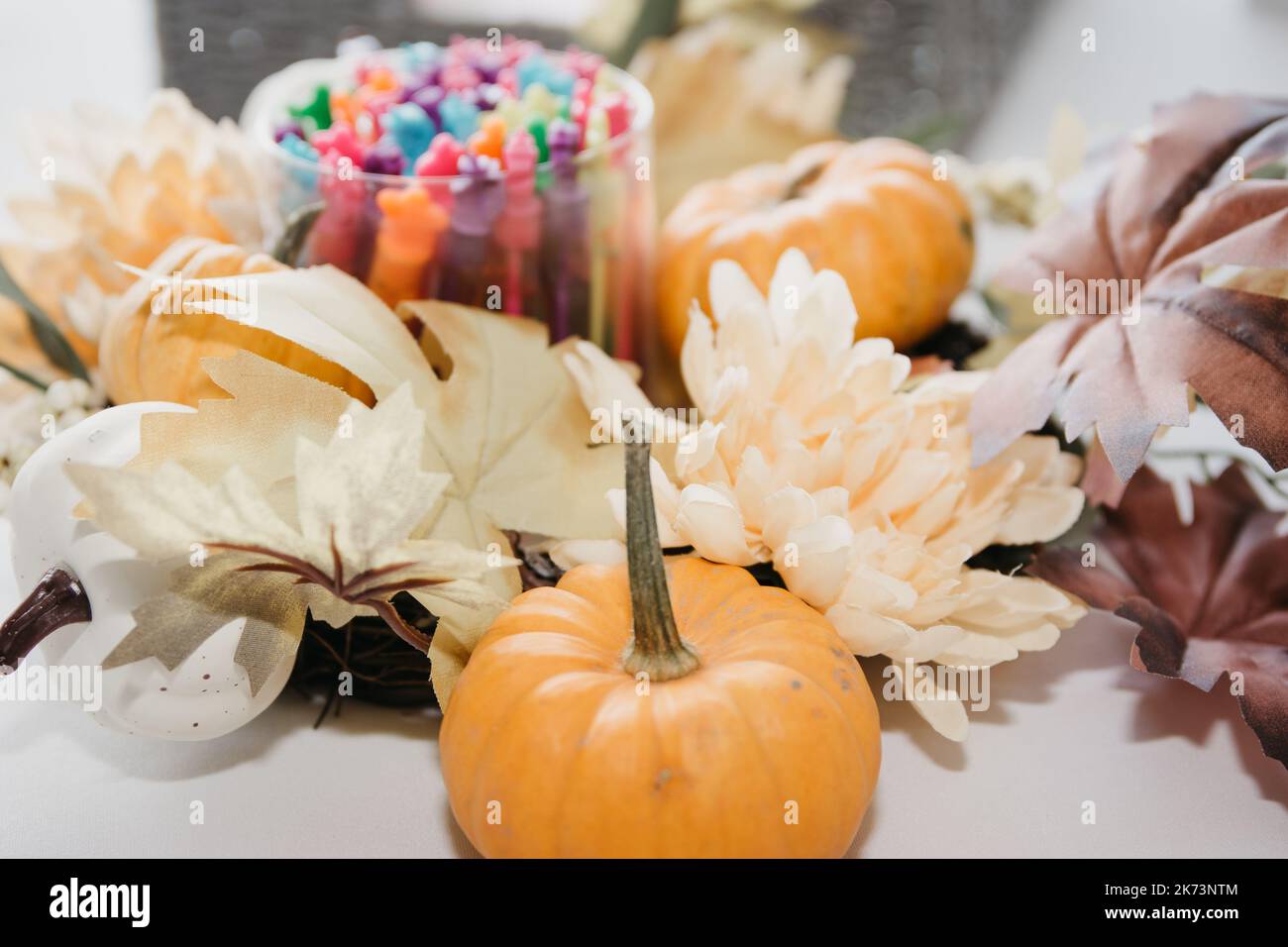 Autumn Wedding Cake covered in sweet fall coloured leaves Stock Photo