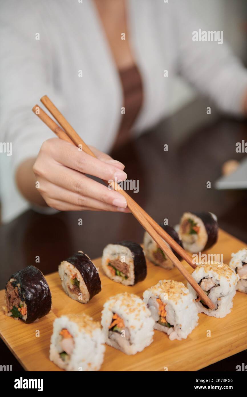 Closeup woman eating delicious hi-res stock photography and images - Alamy