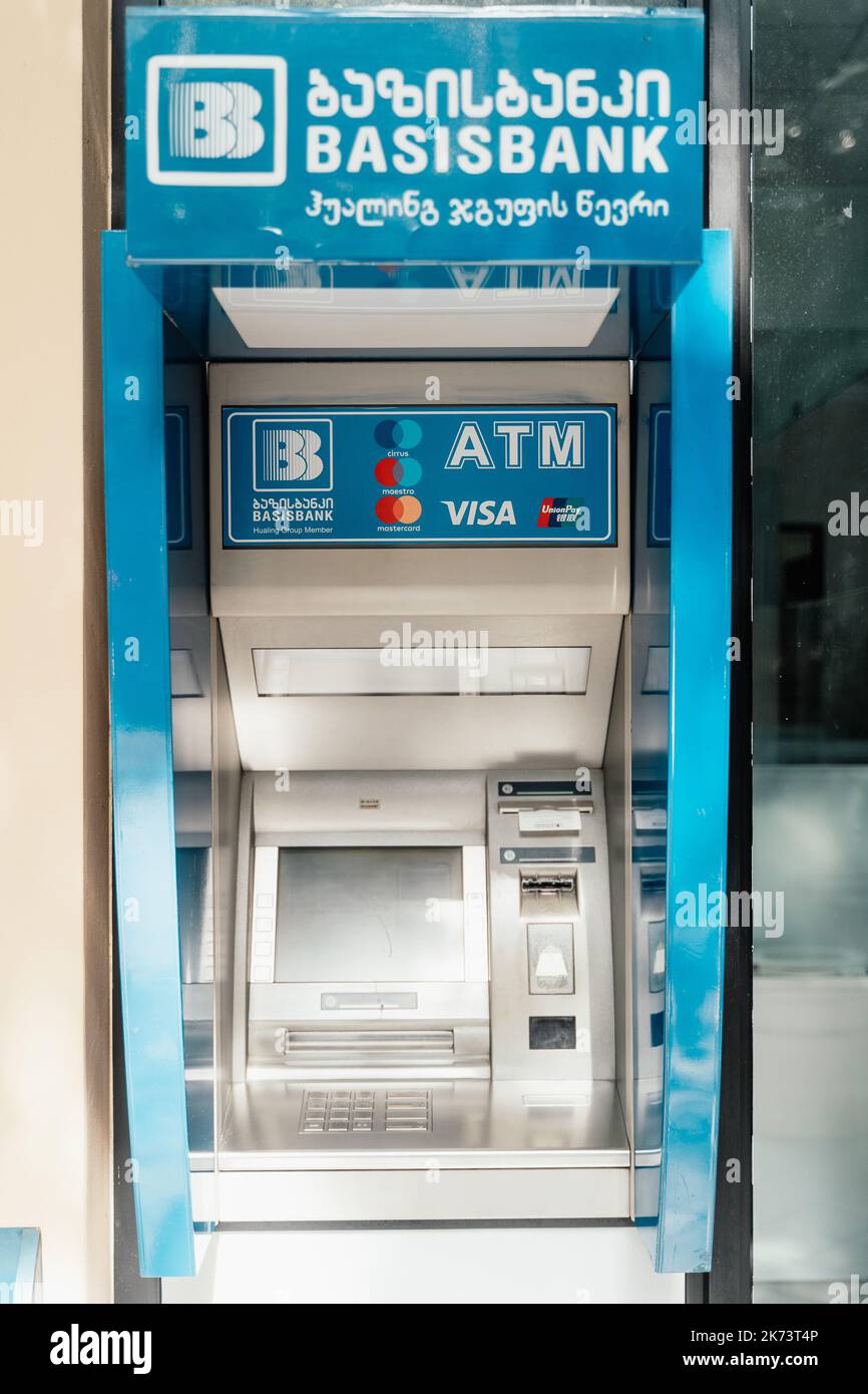 Batumi, Georgia - 04.07.2021: Blue ATM of Basisbank on the street in Batumi, Georgia Stock Photo