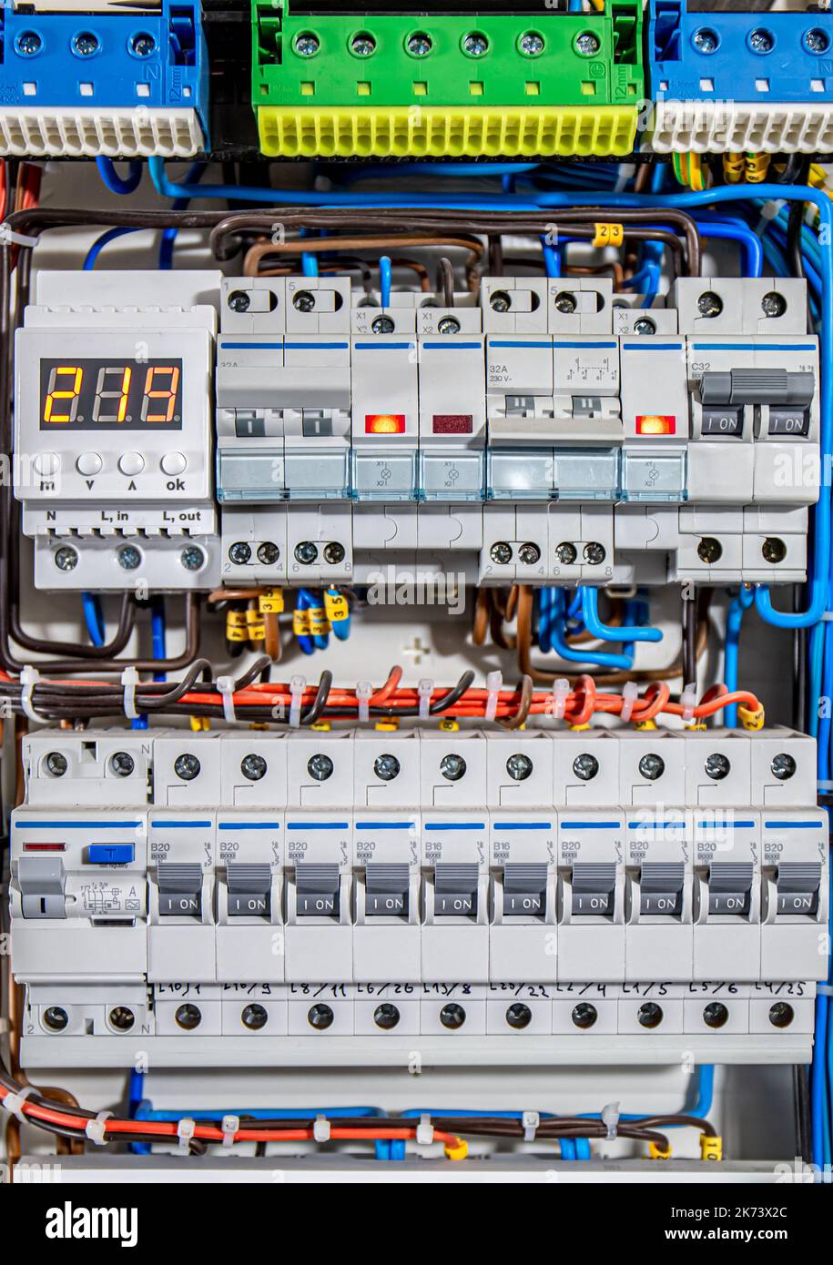 Voltage distributor with automatic switches. Electrical background