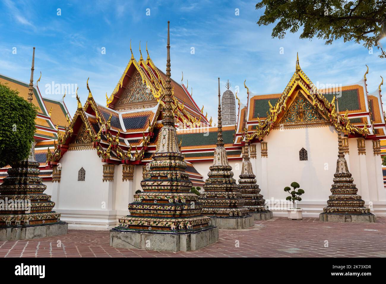 Outdoors of Wat Pho temple showing stupa of royal families in Bangkok Thailand Stock Photo