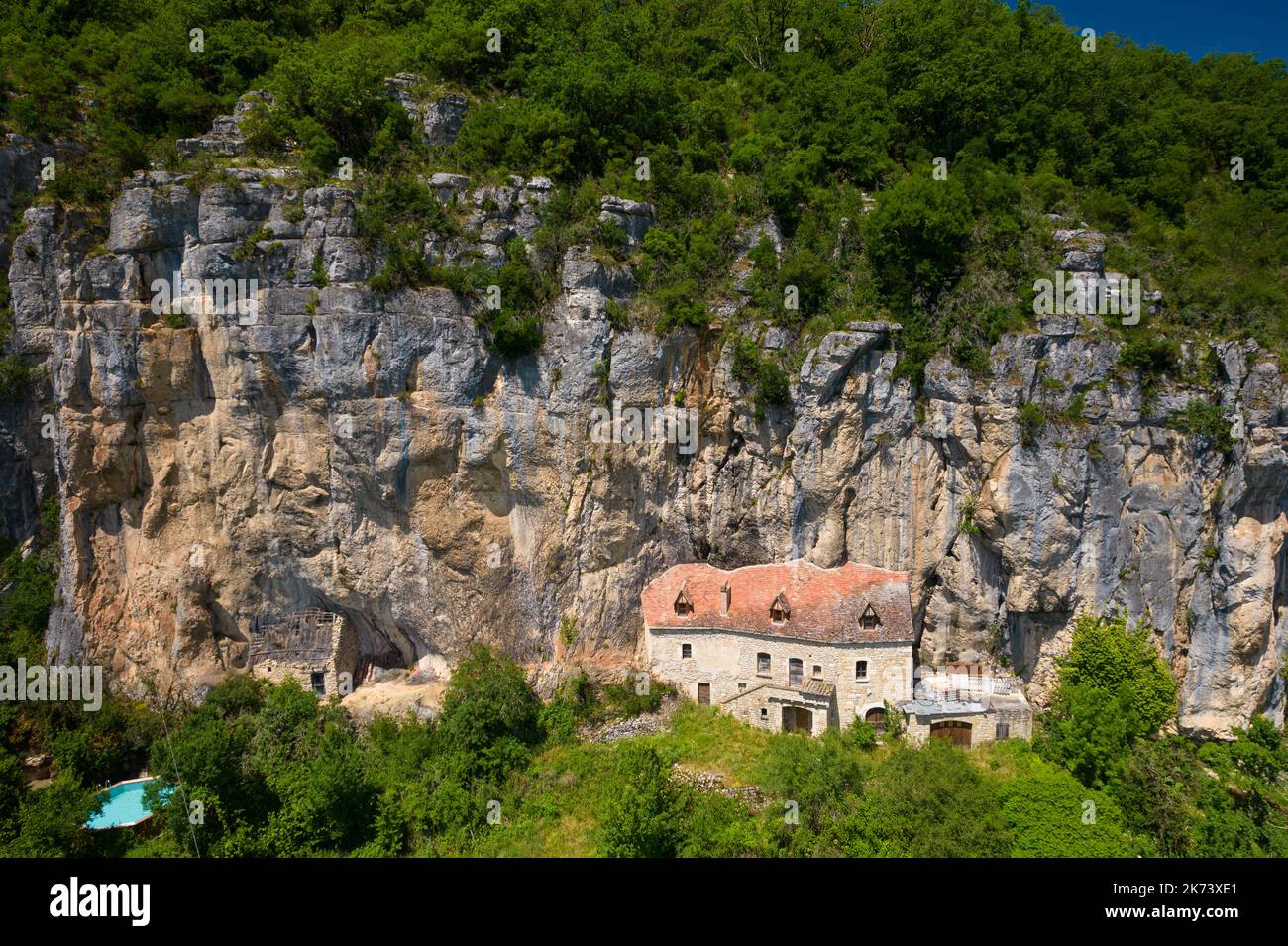 Ancient troglodyte house built in a cliff, Lot department, France Stock Photo