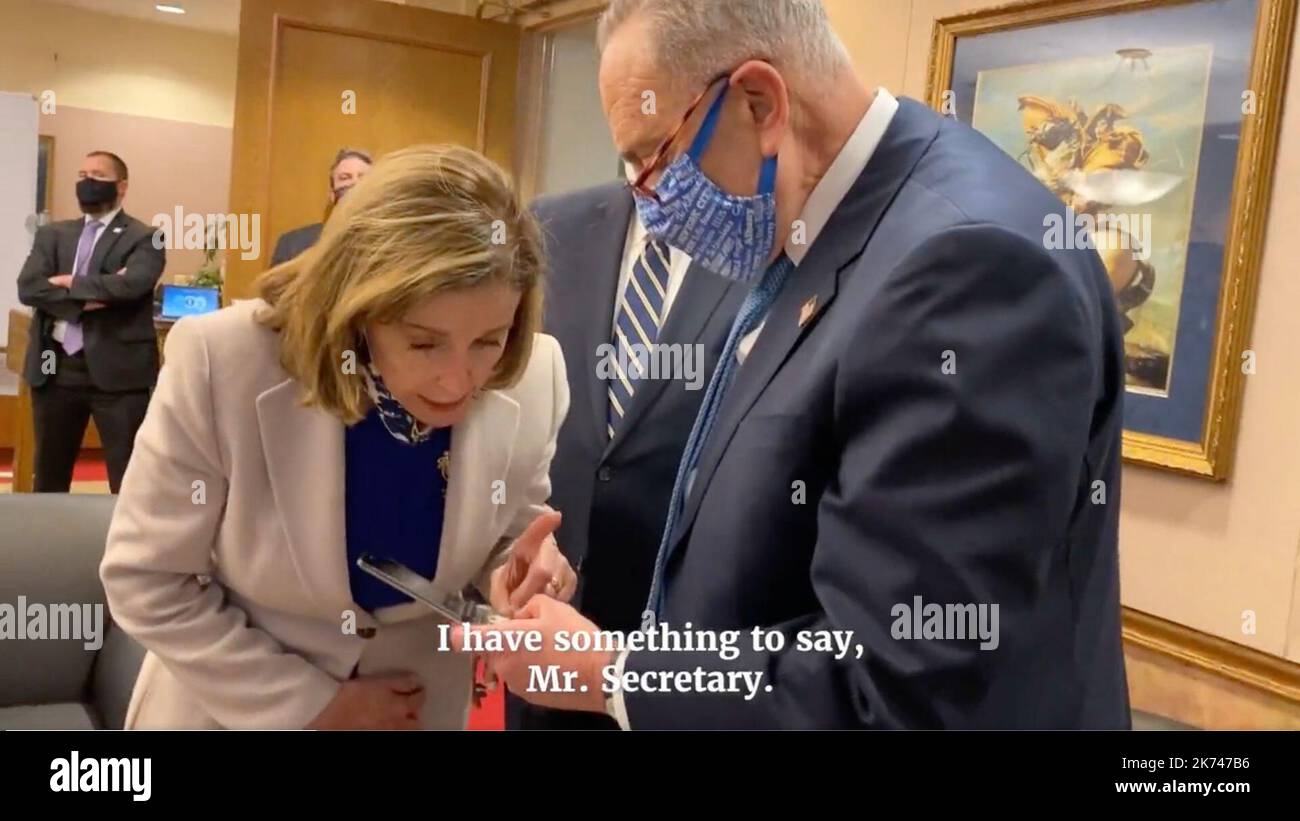 Washington, USA. 14th Oct, 2022. House Speaker Nancy Pelosi (D-Calif.), with Majority Leader Charles E. Schumer (D-N.Y.), tells Christopher Miller, acting defense secretary, that she requested help from D.C. Mayor] Muriel Bowser.(House Jan. 6 committee) Mandatory Credit: Handout/House Jan 6 committee via Credit: Sipa USA/Alamy Live News Stock Photo