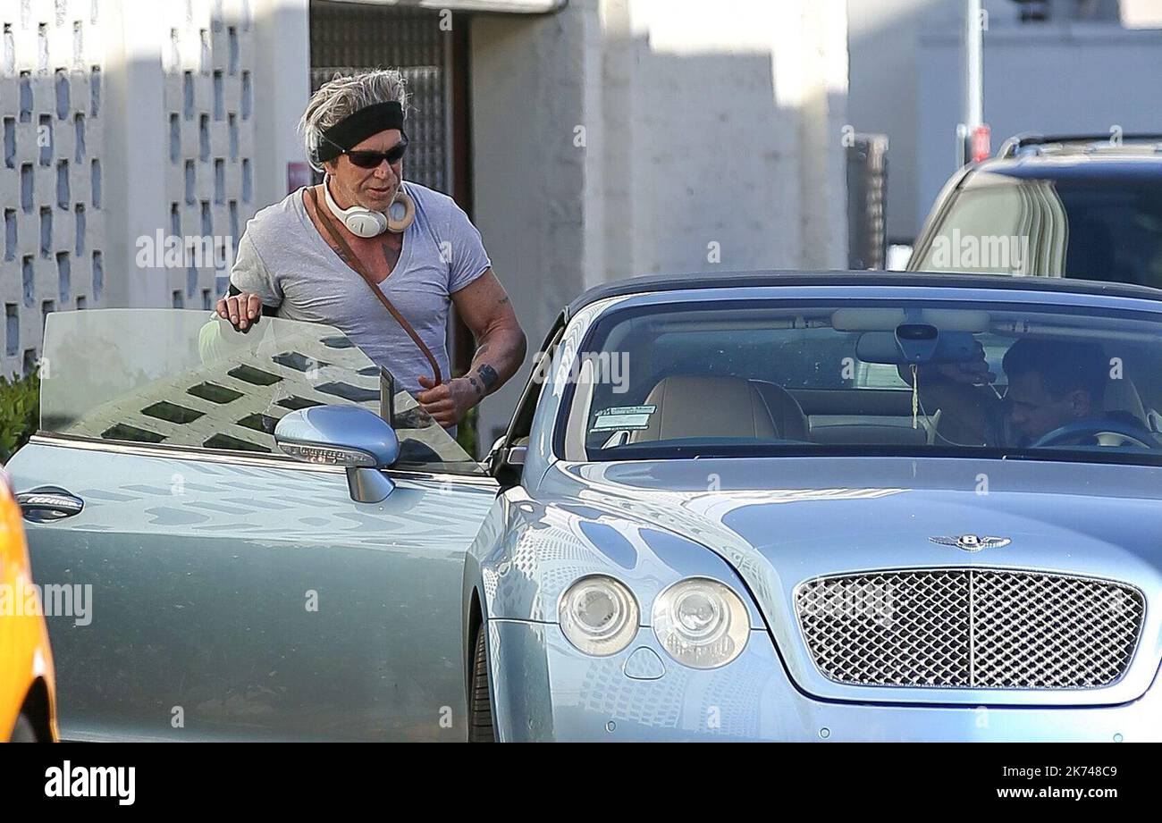 Micky Rourke Car Mickey Rourke is seen entering a blue Bentley in Beverly Hills, USA ...