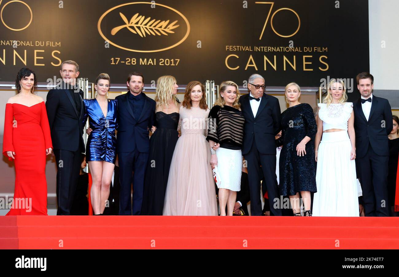 (fromL) French actress Juliette Binoche, French actor Lambert Wilson, French actress Celine Sallette, French actor Pierre Deladonchamps, French actress Sandrine Kiberlain, French actress Isabelle Huppert, French actress Catherine Deneuve, French director Andre Techine, French actress Emmanuelle Beart, French actress Elodie Bouchez and French actor Gregoire Leprince-Ringuet pose as they arrive on May 22, 2017 for the screening of the film 'Nos Annees Folles' (Golden Years) at the 70th edition of the Cannes Film Festival in Cannes, southern France Stock Photo