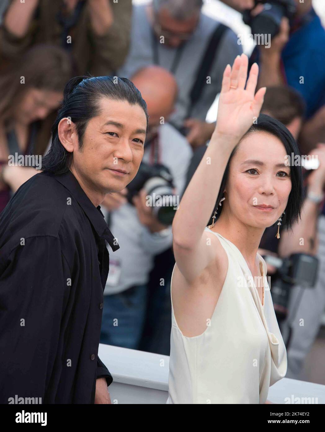 Actors Nagase Masatoshi, Misuzu Kanno and Ayame Misaki attend the 'Hikari (Radiance)' photocall during the 70th annual Cannes Film Festival at Palais des Festivals Stock Photo