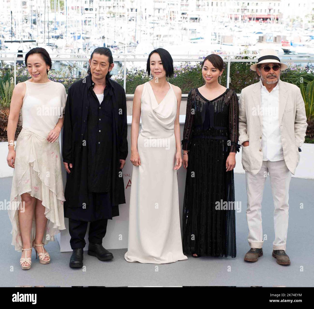 Actors Nagase Masatoshi, Misuzu Kanno and Ayame Misaki attend the 'Hikari (Radiance)' photocall during the 70th annual Cannes Film Festival at Palais des Festivals Stock Photo